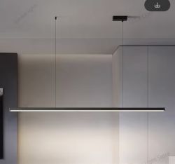 Czarna lampa wisząca LED zawieszona na dwóch cienkich przewodach pod sufitem