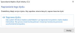 Komunikat o naprawianiu dysku w systemie Windows.