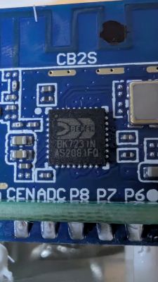 CB2S Module with BK7231N Chip Close-up of CB2S module with BK7231N label on a blue printed circuit board.