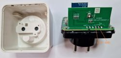 Disassembled Schneider 550B6000 smart plug with visible PCB.