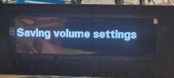 Display showing the message Saving volume settings