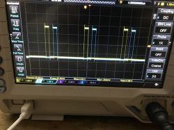 View of an oscilloscope screen displaying PWM signal waveforms.