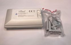 Wireless rH-P1T1 LR F&amp;Home sensor with mounting accessories in a plastic bag.