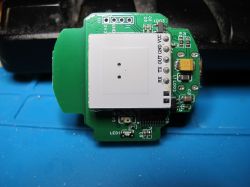 Electronic module with visible components on a printed circuit board.
