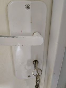 Difficulty Turning Key in Exterior Door: Broken Liner & Incompatible Cylinder Issues Difficulty Turning Key in Exterior Door: Broken Liner & Incompatible Cylinder Issues