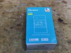 Sonoff POWR316D box on a wooden table
