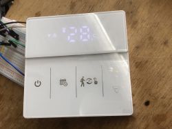 Room Thermostat with LED Screen and Touch Buttons Room thermostat with LED screen and touch buttons.