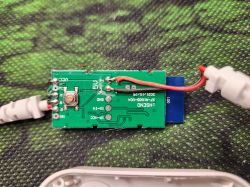 Green PCB with Components Green PCB with various electronic components and wires.