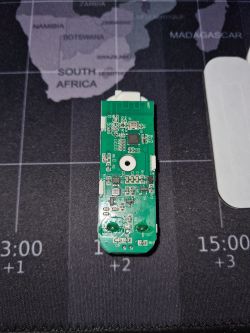 PCB board with BK7231N chip on a world map background.