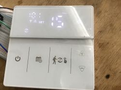 KHY609-WE Room Thermostat with LED Display Room thermostat with LED screen and touch buttons.