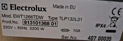 Tabliczka znamionowa pralki Electrolux z modelem EWT1266TDW i danymi technicznymi.
