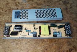 Disassembled 12V 100W LED power supply with internal PCB components exposed