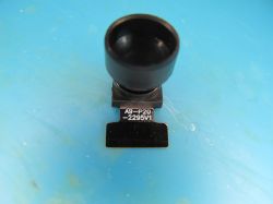 Camera module labeled A9-P20-2295V1 on a blue surface