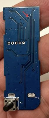 Photo of a circuit board with a marked pin.