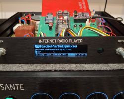 Internet radio player with display showing stream details and open electronics