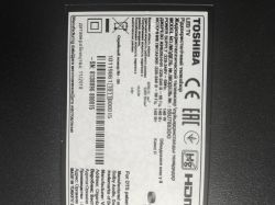 Information label of Toshiba TV model 55UT7830G with technical specifications