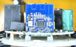 Amysen YX-WS01 Wi-Fi Module with TG7100C Close-up of Amysen YX-WS01 Wi-Fi module with TG7100C chip on a PCB.