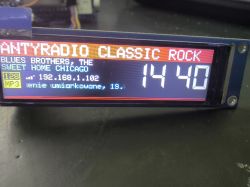LCD screen showing internet radio info and the time 14:40