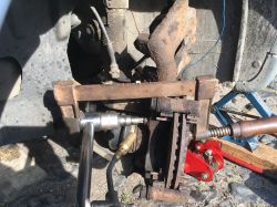 Unscrewing Screws from Brake Yoke: Step-by-Step Guide for Citroen Berlingo Brake Disc Replacement Unscrewing Screws from Brake Yoke: Step-by-Step Guide for Citroen Berlingo Brake Disc Replacement