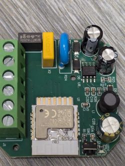CBU Module with Electronic Components Close-up of an electronic module with installed capacitors, resistors, and a chip.
