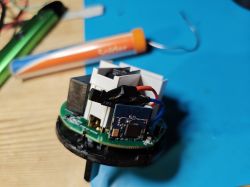 Interior of Smart Plug with WL2S Module Interior of a smart plug with exposed PCB and WL2S module.