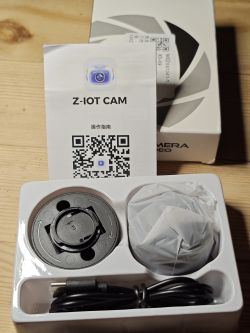 Z-IOT CAM kit with manual and accessories Z-IOT CAM package contents: manual, cable, wrapped camera and mounting parts
