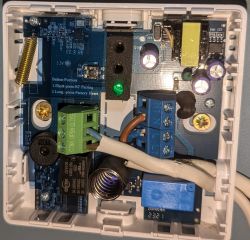 RF Receiver in Thermostat Housing Open RF receiver case with visible electronic components, LED, and connectors.