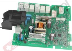 Płyta elektroniczna z różnymi komponentami, w tym kondensatorami i cewkami.