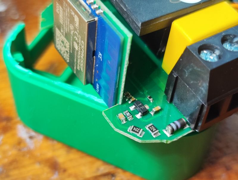 ESP8266 WiFi Module in Dimmer ESP8266 WiFi module mounted on a green PCB inside a dimmer.