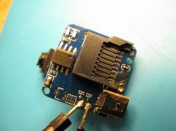 Circuit Board of SQ11 Mini DV Camera Image of a circuit board from an SQ11 Mini DV camera with a visible microSD slot.