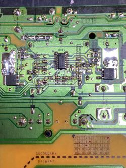 Modified Circuit Board Close-up of a circuit board with modified capacitors and resistors.