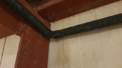 What Causes Sediment Deposits on Copper Pipes in a Central Heating System?