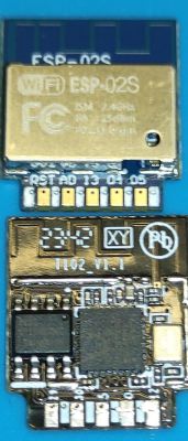 Comparison of ESP-02S and another circuit board Comparison of ESP-02S module and another electronic board on a blue background.