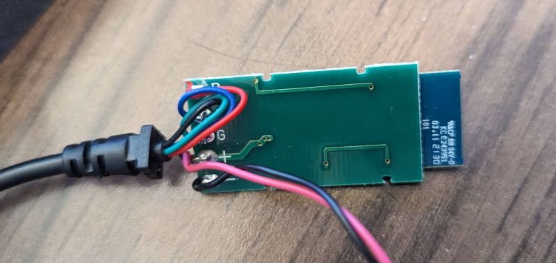 Part of the smart RGB lighting strip circuit with connected wires.