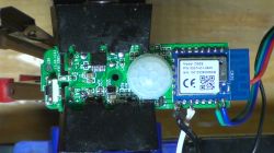 Close-up of a circuit board with soldered wires and a module labeled CB3S.