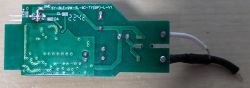 Circuit Board of Appio Smart Bulb Circuit board of an Appio smart bulb on a wooden surface.