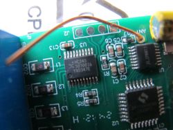 Tuya SPI LED Controller Circuit Board Close-up of a printed circuit board with visible integrated circuits and wire connections.