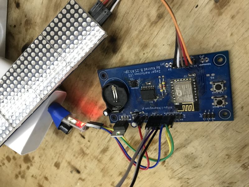 ESP8266 board with LED matrix display and multicolored connection wires