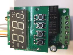 Electronic module with a display and buttons.