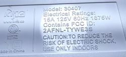 Label on KMC device model 30407 with electrical information and warning.