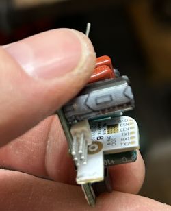 Close-up view of a PCB in the electronic component of a light bulb.