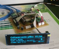 Audio player prototype with 3.12-inch OLED displaying MP3 file information