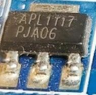 APL1117 PJA06 voltage regulator chip in SOT-223 package on PCB