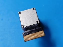Spy Camera Module with 18-pin FFC Connector Mini camera module with metal cover and 18-pin FFC connector on a blue background.