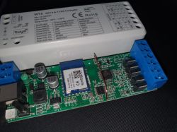 Image of the LED controller WT5 PCB with a WB3S Wi-Fi module and four connection pins.