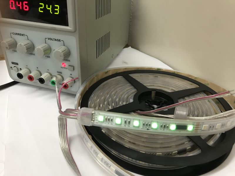 RGBW LED Strip with TM512C4 Controllers and Connectors RGBW LED strip with visible connectors and segments, each controlled by TM512C4 chip.