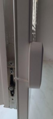 Sensor mounted on window frame.
