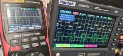 Hantek DSO2C10 digital oscilloscope and digital multimeter showing waveforms on their displays.