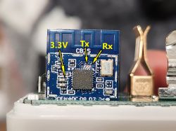 CB2S Board with Connection Points Labeled Close-up of a CB2S board with labels 3.3V, Tx, and Rx.