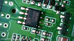 Close-up of ST1040 Integrated Circuit on PCB Close-up of an integrated circuit on a printed circuit board, marked ST1040.